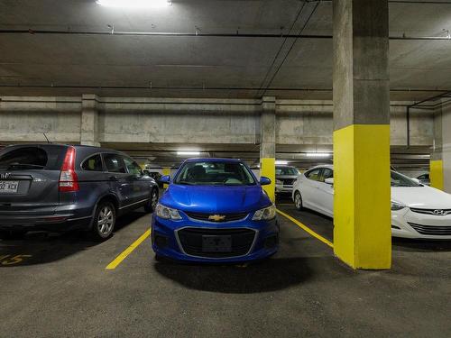 Garage - 410-480 Boul. Galland, Dorval, QC - Indoor Photo Showing Garage