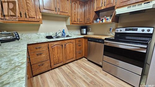 406 Centre Street, Cabri, SK - Indoor Photo Showing Kitchen With Double Sink