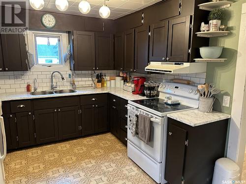 208 Margaret Street, Bulyea, SK - Indoor Photo Showing Kitchen With Double Sink