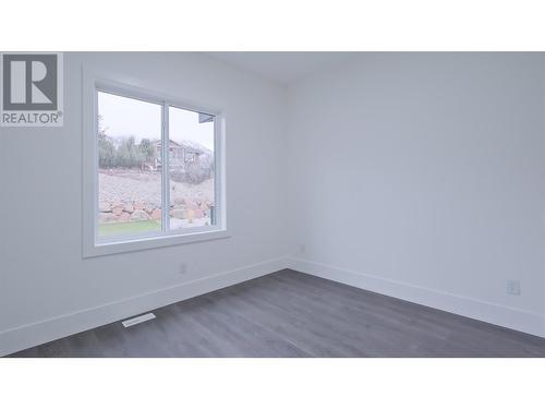 Second bedroom upper level main house - 2798 Canyon Crest Drive, West Kelowna, BC - Indoor Photo Showing Other Room