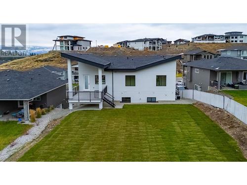 Pool size backyard w/covered deck off kitchen - 2798 Canyon Crest Drive, West Kelowna, BC - Outdoor