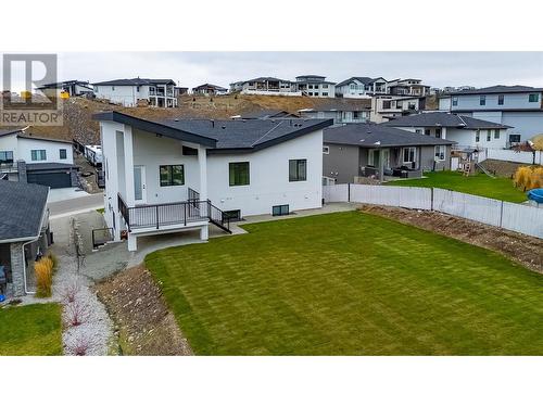 Pool size backyard w/covered deck off kitchen - 2798 Canyon Crest Drive, West Kelowna, BC - Outdoor