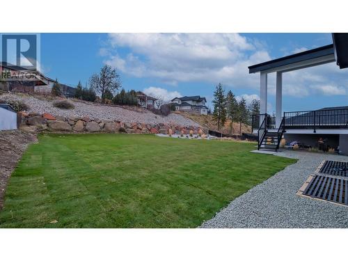 Pool size backyard w/covered deck off kitchen - 2798 Canyon Crest Drive, West Kelowna, BC - Outdoor