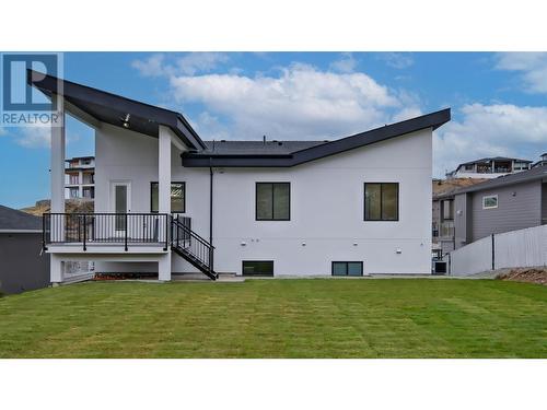 Pool size backyard w/covered deck off kitchen - 2798 Canyon Crest Drive, West Kelowna, BC - Outdoor