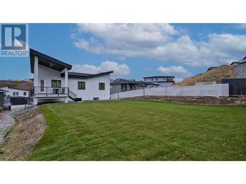 Pool size backyard w/covered deck off kitchen - 2798 Canyon Crest Drive, West Kelowna, BC - Outdoor