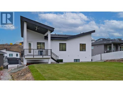 Pool size backyard w/covered deck off kitchen - 2798 Canyon Crest Drive, West Kelowna, BC - Outdoor