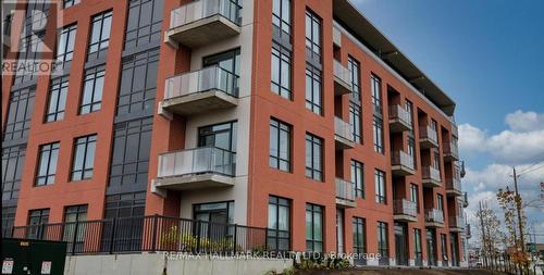 513 - 1010 Dundas Street E, Whitby, ON - Outdoor With Balcony With Facade