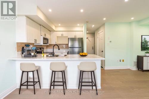 B202 - 98 Cornell Park Avenue, Markham, ON - Indoor Photo Showing Kitchen