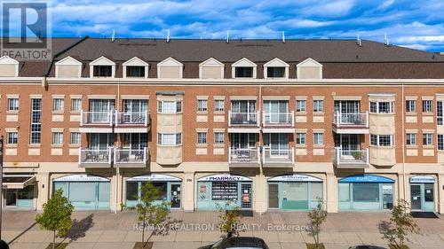 B202 - 98 Cornell Park Avenue, Markham, ON - Outdoor With Facade