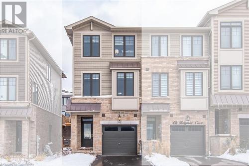 Townhome / multi-family property with a garage - 44 Hollywood Court, Cambridge, ON - Outdoor With Facade