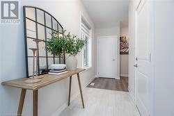 Foyer entrance featuring light hardwood / wood-style flooring - 