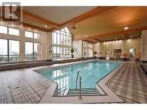 909 - 4090 Living Arts Drive, Mississauga, ON - Indoor Photo Showing Other Room With In Ground Pool