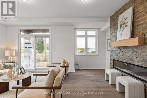 12 Wyn Wood Lane, Orillia, ON - Indoor Photo Showing Living Room With Fireplace