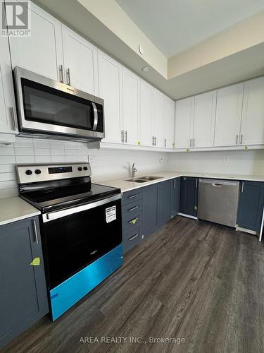 128 - 8175 Britannia Road, Milton, ON - Indoor Photo Showing Kitchen With Stainless Steel Kitchen