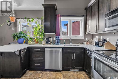 64 331 Pendygrasse Road, Saskatoon, SK - Indoor Photo Showing Kitchen With Double Sink