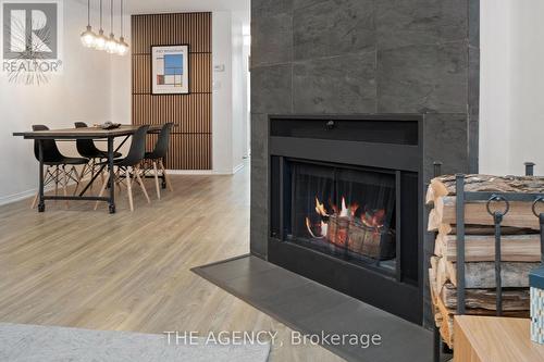 4D Shank Street, Toronto, ON - Indoor Photo Showing Living Room With Fireplace