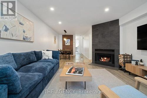 4D Shank Street, Toronto, ON - Indoor Photo Showing Living Room With Fireplace