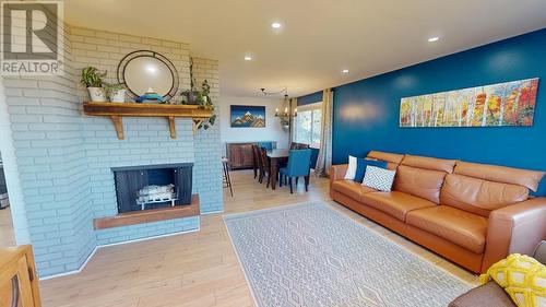 10204 Turner Crescent, Hudsons Hope, BC - Indoor Photo Showing Other Room With Fireplace