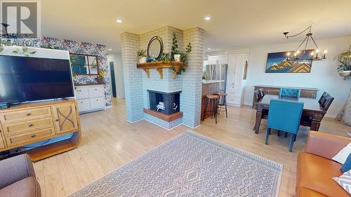 10204 Turner Crescent, Hudsons Hope, BC - Indoor Photo Showing Living Room With Fireplace