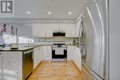 76 Kate Aitken Crescent, New Tecumseth, ON - Indoor Photo Showing Kitchen With Stainless Steel Kitchen