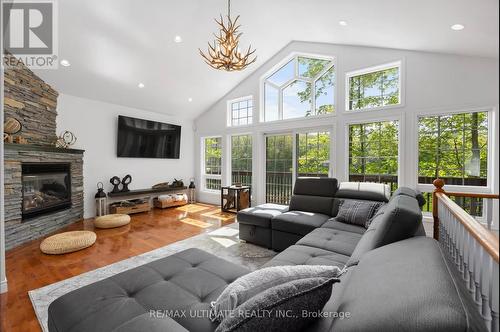 157 Farlain Lake Road W, Tiny, ON - Indoor Photo Showing Living Room With Fireplace