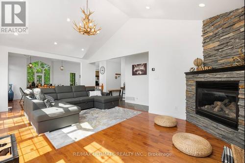 157 Farlain Lake Road W, Tiny, ON - Indoor Photo Showing Living Room With Fireplace