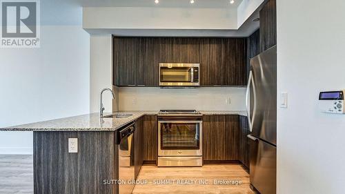 3305 - 20 Shore Breeze Drive, Toronto, ON - Indoor Photo Showing Kitchen With Upgraded Kitchen