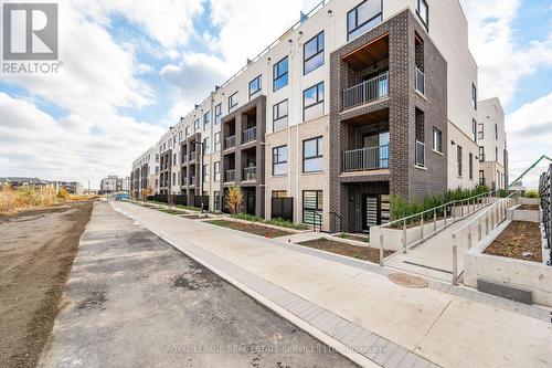 305 - 349 Wheat Boom Drive, Oakville, ON - Outdoor With Balcony With Facade