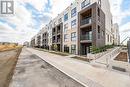 305 - 349 Wheat Boom Drive, Oakville, ON  - Outdoor With Balcony With Facade 