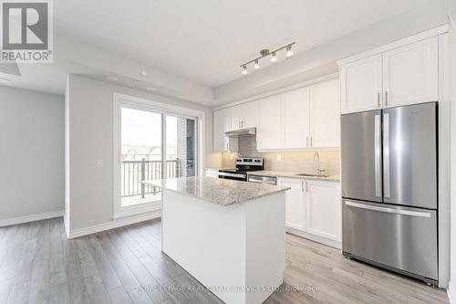 305 - 349 Wheat Boom Drive, Oakville, ON - Indoor Photo Showing Kitchen With Stainless Steel Kitchen With Upgraded Kitchen