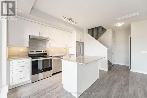 305 - 349 Wheat Boom Drive, Oakville, ON - Indoor Photo Showing Kitchen With Stainless Steel Kitchen With Upgraded Kitchen