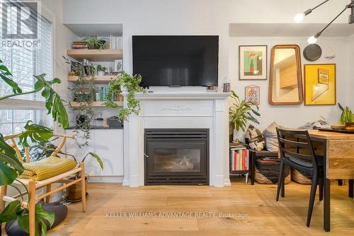 812 - 5 Everson Drive, Toronto, ON - Indoor Photo Showing Living Room With Fireplace