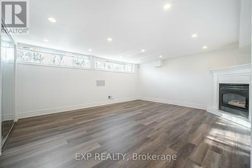 108 Lynedock Crescent, Toronto, ON - Indoor Photo Showing Other Room With Fireplace