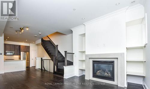 64 - 71 Elder Avenue, Toronto, ON - Indoor Photo Showing Living Room With Fireplace