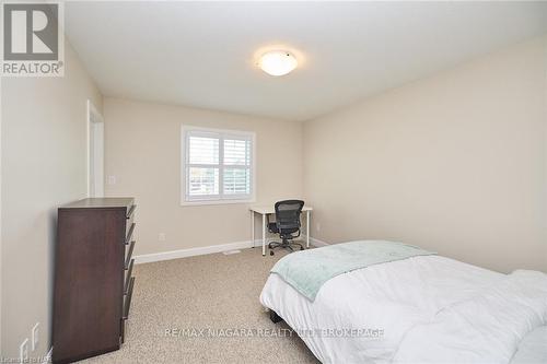 3823 Simpson Lane, Fort Erie (327 - Black Creek), ON - Indoor Photo Showing Bedroom