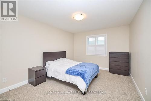 3823 Simpson Lane, Fort Erie (327 - Black Creek), ON - Indoor Photo Showing Bedroom