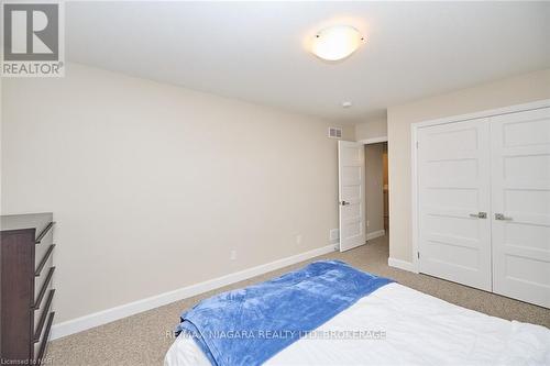 3823 Simpson Lane, Fort Erie (327 - Black Creek), ON - Indoor Photo Showing Bedroom