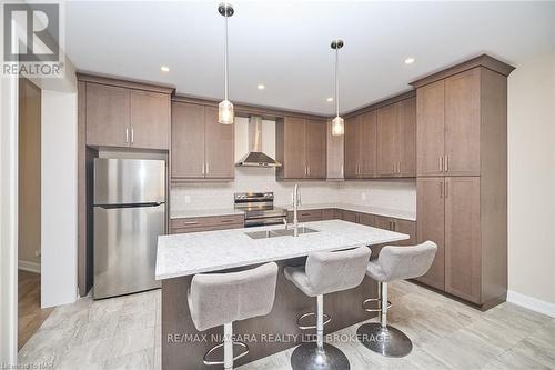 3823 Simpson Lane, Fort Erie (327 - Black Creek), ON - Indoor Photo Showing Kitchen With Double Sink