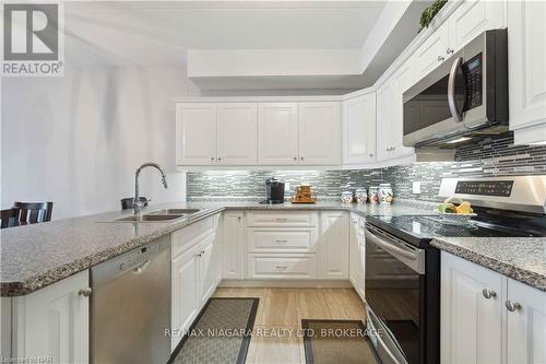 221 - 4644 Pettit Avenue Avenue, Niagara Falls (212 - Morrison), ON - Indoor Photo Showing Kitchen With Double Sink With Upgraded Kitchen