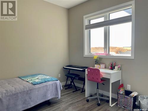 834 1St Avenue N, Warman, SK - Indoor Photo Showing Bedroom