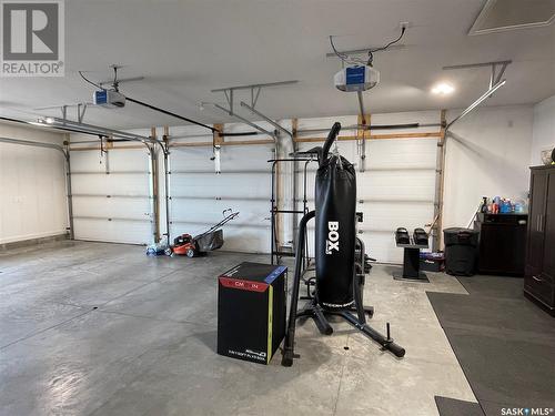 834 1St Avenue N, Warman, SK - Indoor Photo Showing Garage