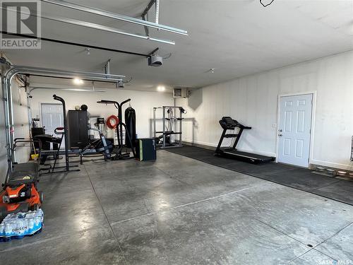 834 1St Avenue N, Warman, SK - Indoor Photo Showing Garage