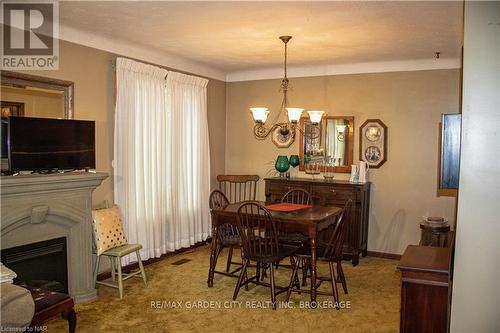 35 Mcdonagh Crescent, Thorold (558 - Confederation Heights), ON - Indoor Photo Showing Dining Room With Fireplace