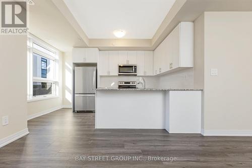 111 - 1573 Rose Way, Milton, ON - Indoor Photo Showing Kitchen With Upgraded Kitchen