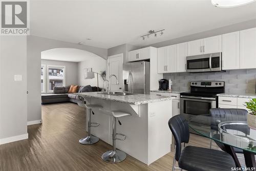 5324 Green Bluebell Road E, Regina, SK - Indoor Photo Showing Kitchen With Stainless Steel Kitchen With Double Sink With Upgraded Kitchen