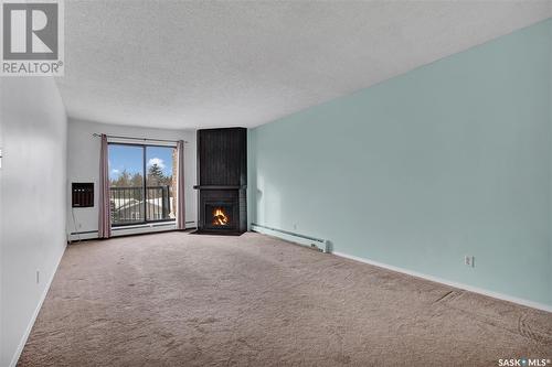 405 802A Kingsmere Boulevard, Saskatoon, SK - Indoor With Fireplace