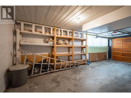 garage - 6477 Southwind Road, Vernon, BC - Indoor Photo Showing Garage