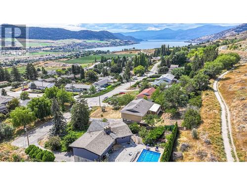 grey canal trail running behind the backyard - 6477 Southwind Road, Vernon, BC - Outdoor With Body Of Water With View