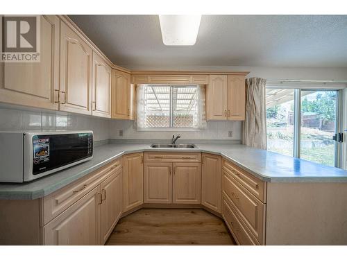 6477 Southwind Road, Vernon, BC - Indoor Photo Showing Kitchen With Double Sink