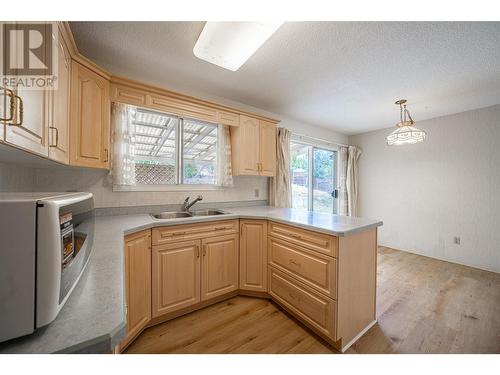 6477 Southwind Road, Vernon, BC - Indoor Photo Showing Kitchen With Double Sink